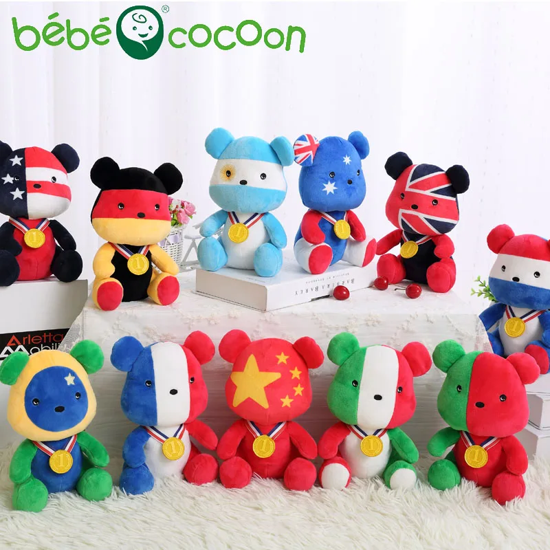 Bebecocoon 2017 20 см 25 Национальный Пособия по немецкому языку флаг Мишка Куклы золотая