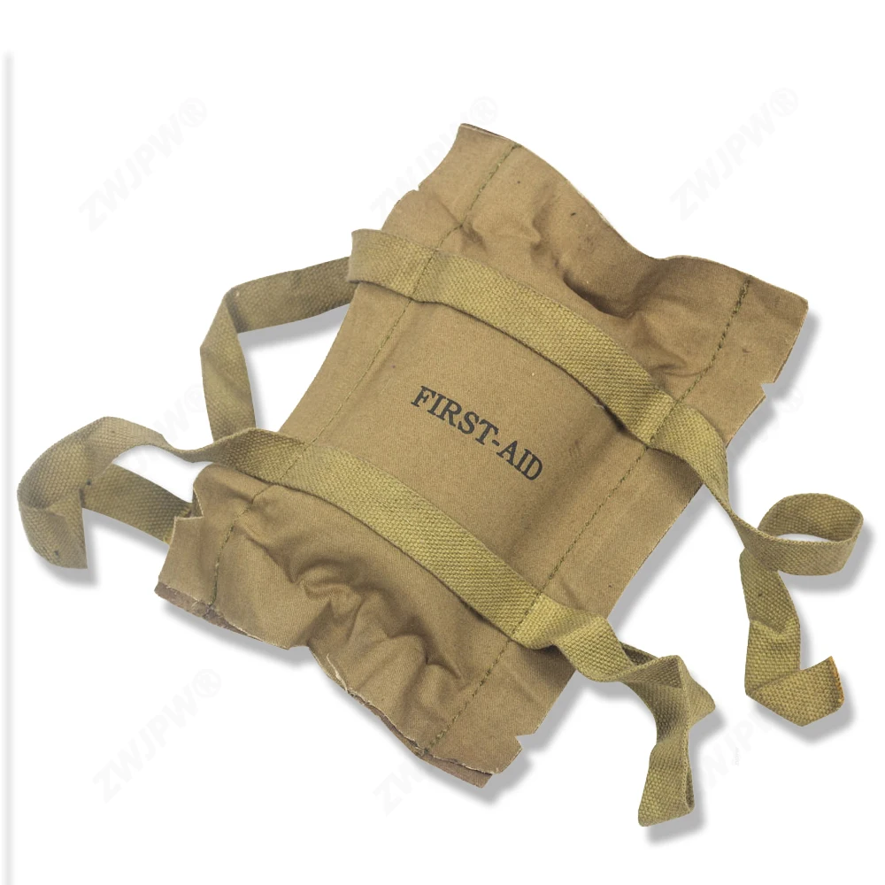 

WW2 US MILITARY ARMY TROOPER SOLDIER FIRST AID KIT BANDAGE COLLECTION MEDIC GEAR US/108101