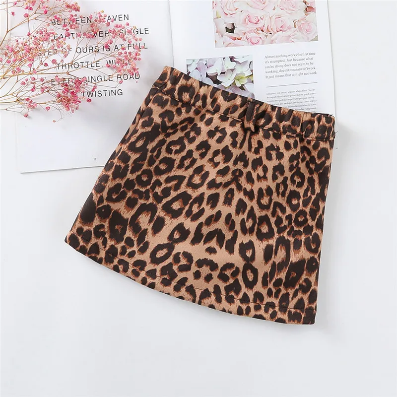 Детская юбка трапециевидная мини-юбка с высокой талией Новинка лета года, кожаная леопардовая юбка с карманами на одной пуговице для маленьких девочек