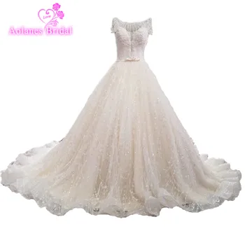 

Real Work Wedding Dresses With Crystals Ball Gown Champange Color Bling Bling Luxurious Lace Handworks Bridal Wedding Dresses