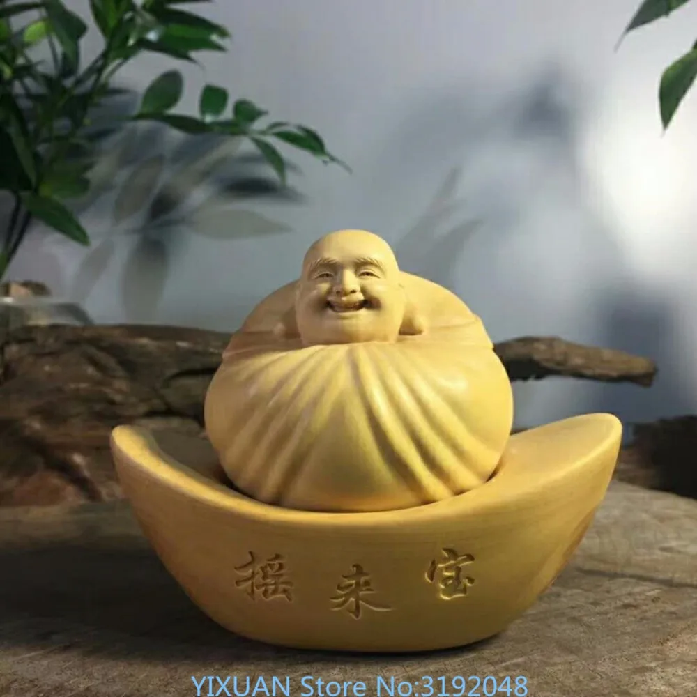 

The boxwood carvings carved Buddha Maitreya Budaoweng shake treasure car, Home Furnishing decoration crafts.