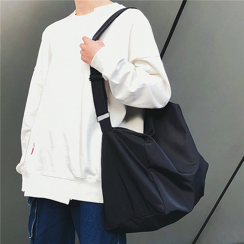 

Male lazy wind canvas bag female waterproof Oxford cloth large capacity simple Japanese messenger bag leisure