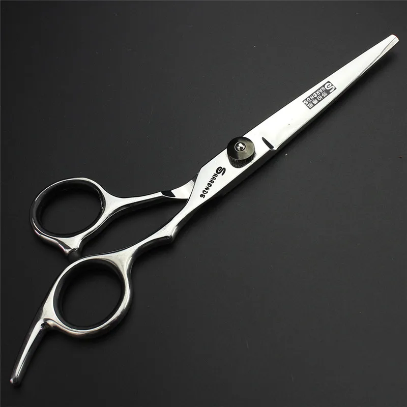 The new 6-inch high hardness scissors professional hairdresser modeling design hairdressing scissors set free shipping The new 6-inch high hardness scissors professional hairdresser modeling design hairdressing scissors set free shipping