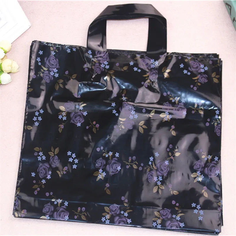 

High-density Polythylene Eco-friendly Large Plastic Packaging with Flower With Handles 10pcs/lot 29*35cm Clothes Shopping Bags