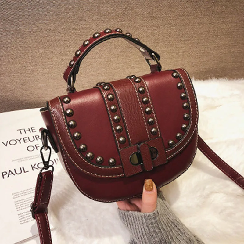 

2019 four seasons explosions chain slung fashion multi-purpose rivet saddle bag wild elegant retro female shoulder bag