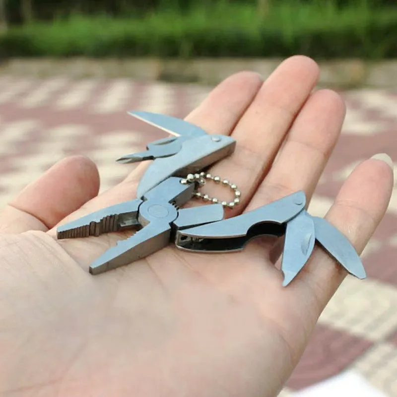 Camping portátil al aire libre Mini plegable multifunción conjunto de herramientas de bolsillo llavero alicates cuchillo destornillador llavero Llaveros