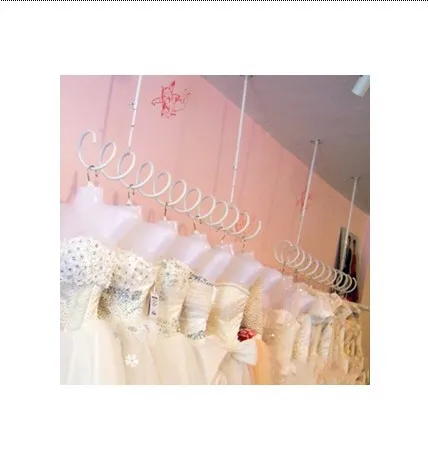 Wrought iron wall on clothing clothing store shelves Condole top clothing display shelf hanger