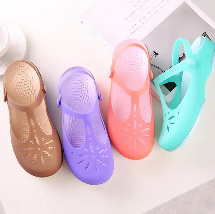 

2018 summer new Mary Jane hole shoes beach shoes hollow flowers jelly shoes ladies sandals and slippers