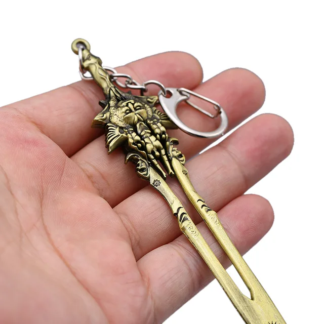  crafthand Kratos Weapon Blade of Olympus Vintage Keychain  Metallic Keyring Great Birthday Present for Friends Game Peripheral  Collection Backpack Pendant : Clothing, Shoes & Jewelry