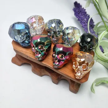 

2019 hot 8pcs mini angel reiki crystal skull deuce in different colors with a hollowed-out hand carving figurine Free shipping