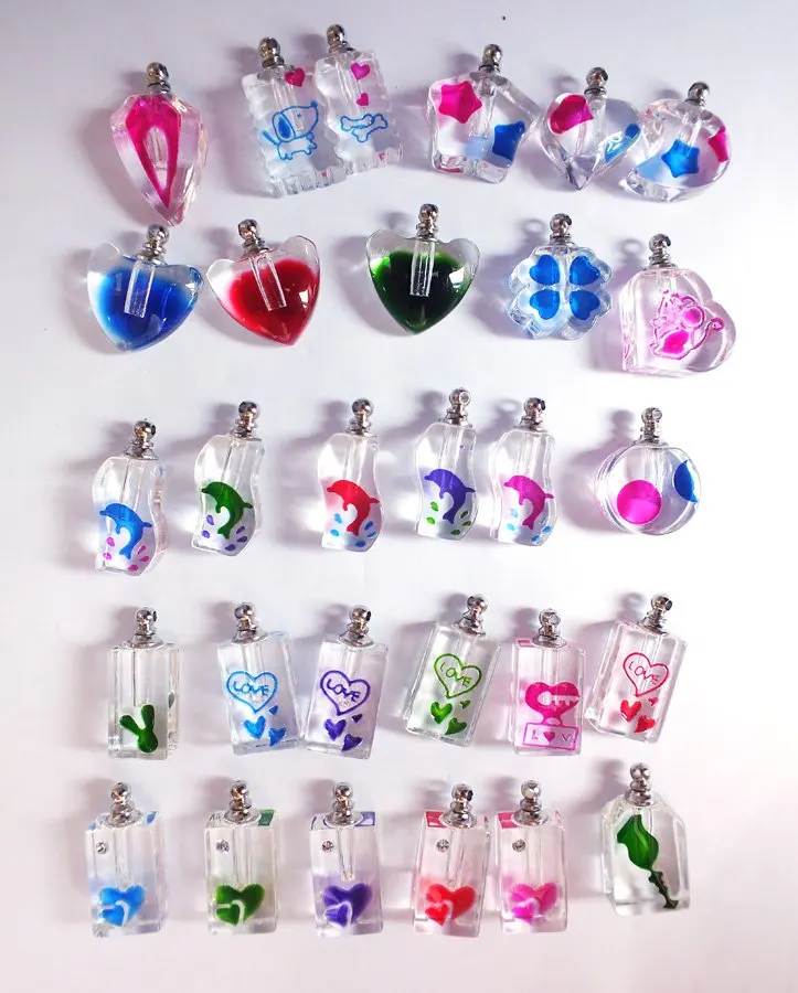 

Free shipping!!!shape mixed color mixed devise crystal Perfume pendant Vials Rice charms