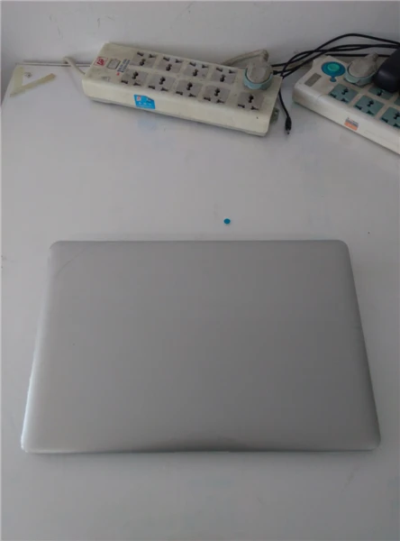 

4G RAM 320GB harddisk laptop Activated Windows 7 8 10 14inch Quad CORE spain russian language OS Laser keyboard battery remove