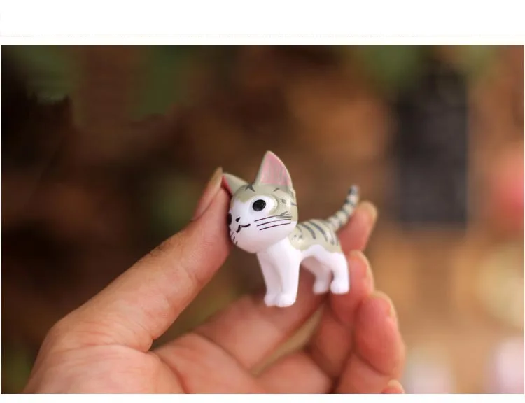 small plastic cats