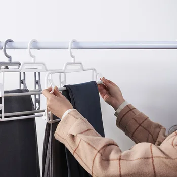 

Creative Plastic Rotating Storage Rack Organizer Home Bedroom Cabinet Anti-Wrinkle Magic Can Be Rotated To Remove Pants Rack