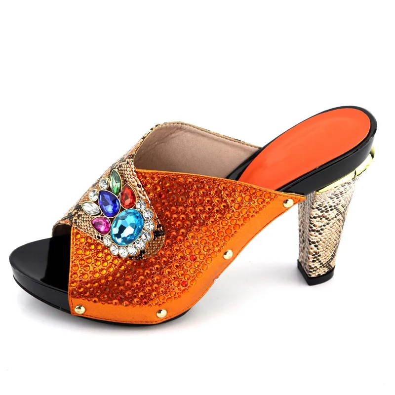 orange and black dress shoes