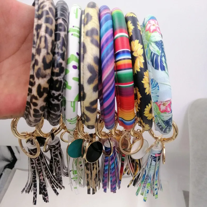 

100Pcs/Lot Pu Leather Bracelet Keychain With Tassels Faux Leather Round Bracelet Keychain Sunflower Leopard Serape Cactus Gift