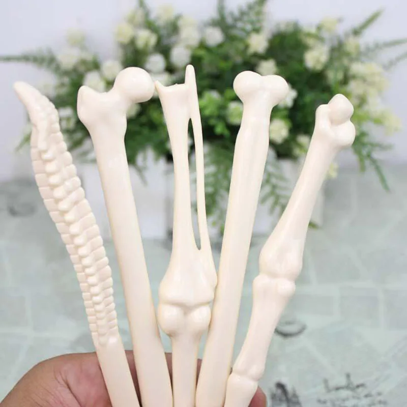 

50pcs/lot Creative bones ballpoint pens black ink 0.5mm bone ball pen korean stationery gift office school supplies WJ0038