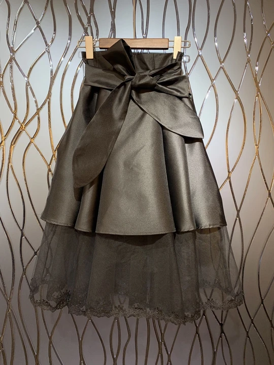 

2019 summer new women's wild personality knotted waist fight mesh half skirt