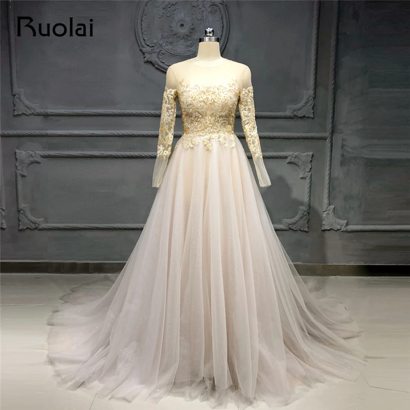 gold long sleeve gown