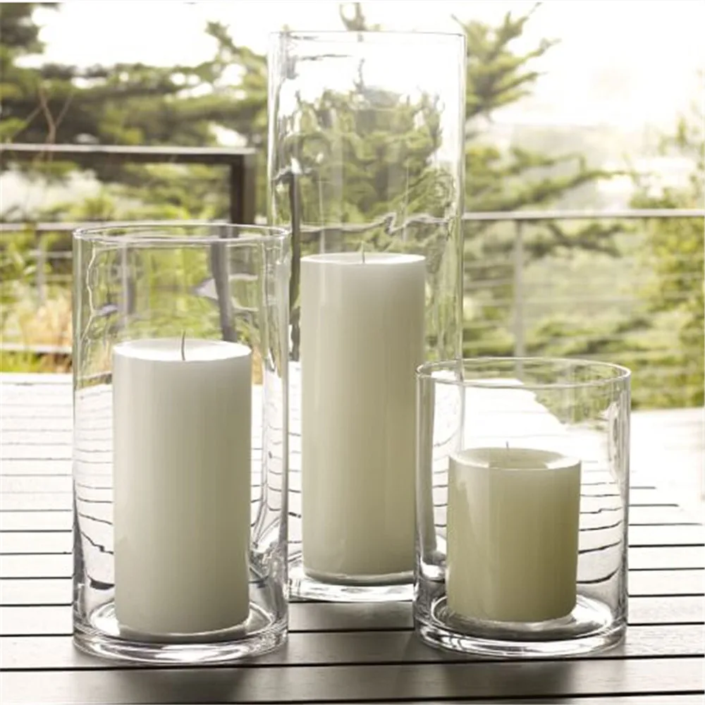 western style simple glass cylinder clear candle holders en Candelabros