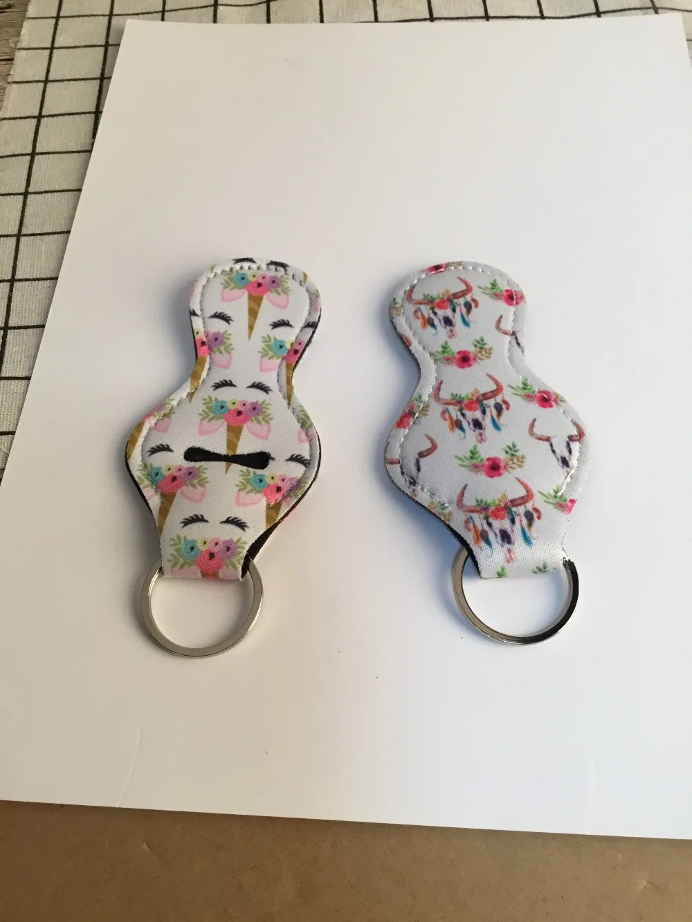 

Wholesal Bull skull Chapstick Holder Neoprene KeyFob, Unicorn Pattern Lip Palm Holder Die Cut with Metal Ring DOMIL-1010847