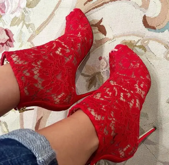 black heel boots with red laces