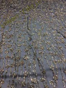 

gold color embroidered mesh material with glitter French net lace fabric