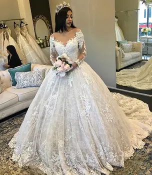 

Amazing New Puffy Wedding Dresses 2019 Sheer Neck Long Sleeves Ball Gown Chapel Train Beaded Lace Bride Dress Gowm