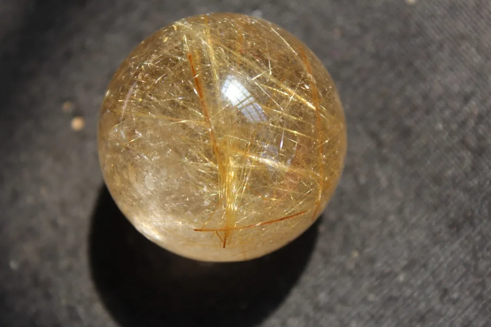 

Natural rutilated quartz crystal ball