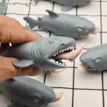

Simulation Plastic shark Creative Squeeze Toys Hungry Shark with Pop Out Surfer Leg Toy Stress Relief Funny Spoof Trick Gift