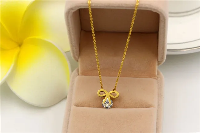 Martick-Chapado-En-Oro-Bowknot-Forma-AAA-CZ-Colgante-de-Acero-Inoxidable-316L-Enlace-Collar-de (4)