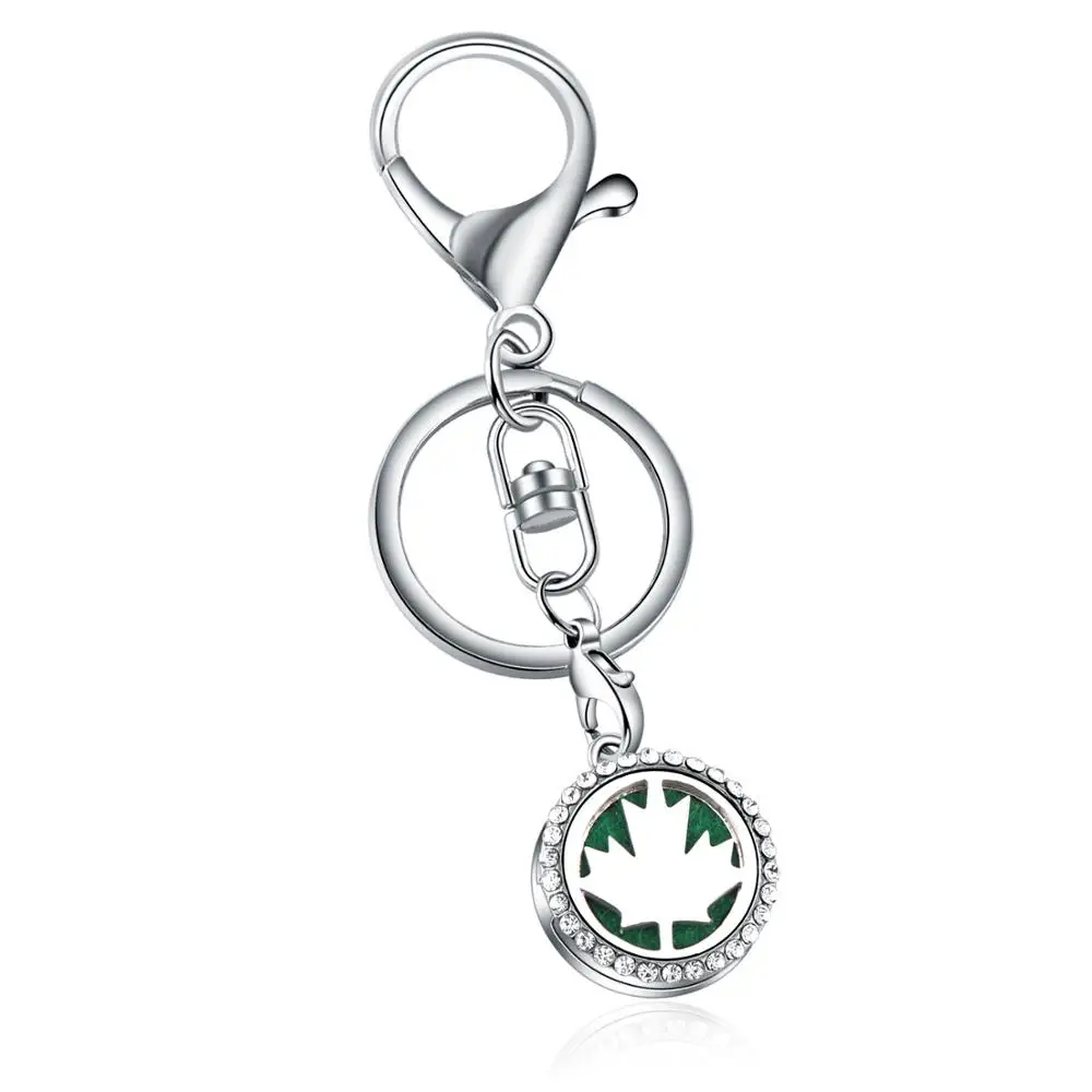 

Stainless Steel Maple leaf Essential Perfume full Rhinestone KeyChain Oil Diffuser Perfume Aromatherapy Locket Key Chain Gift