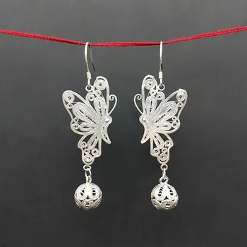 

Ethnic Style and Ancient Style Jewelry Handmade Miao Silver Earrings Fashionable Retro Hollow Butterfly Ball Earrings