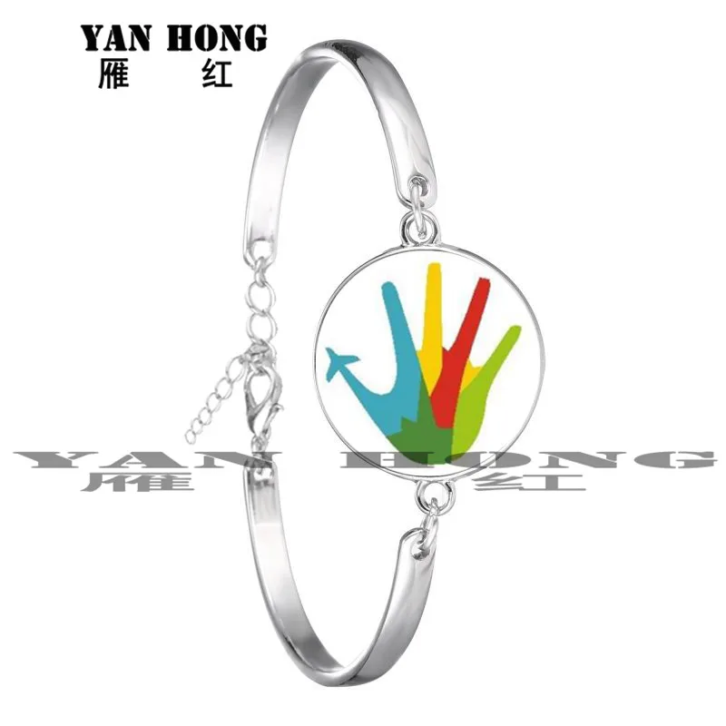 

Fashionable and beautiful bracelet. Glass crystal 18MM. Handmade. Geometric elements, pictures. It's meaningful jewelry.