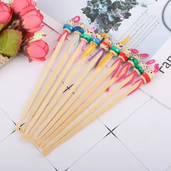 

Cute Mini Doll Earpicks Wood Bamboo Ear Picks Wax Remover Cleaner Ear Care Tool