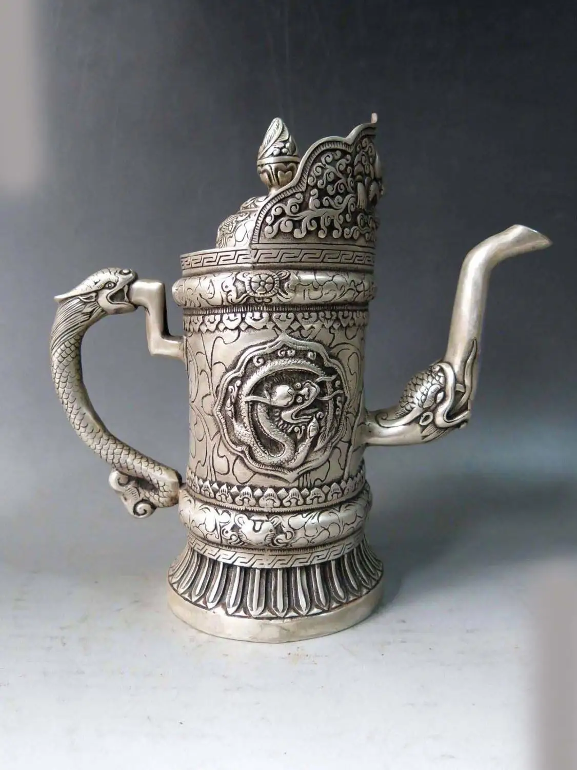 

9" China tibet silver carved dragon buddha Buttered tea Teapot pot Statue