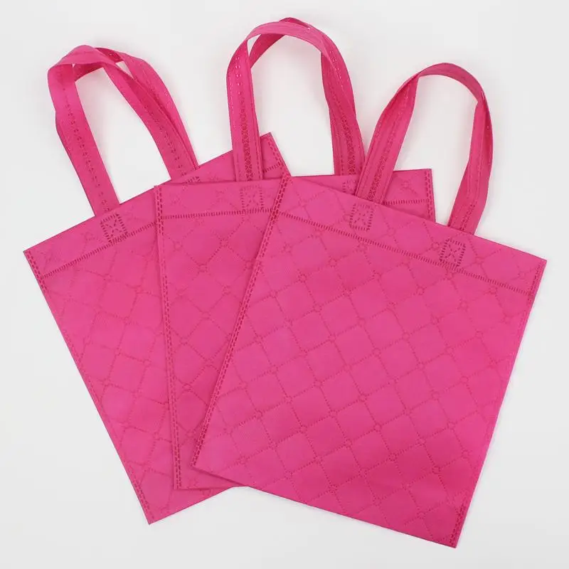 50pcs/lot 27.5x25+8cm Embossed non woven tote bags/plastic gift bags