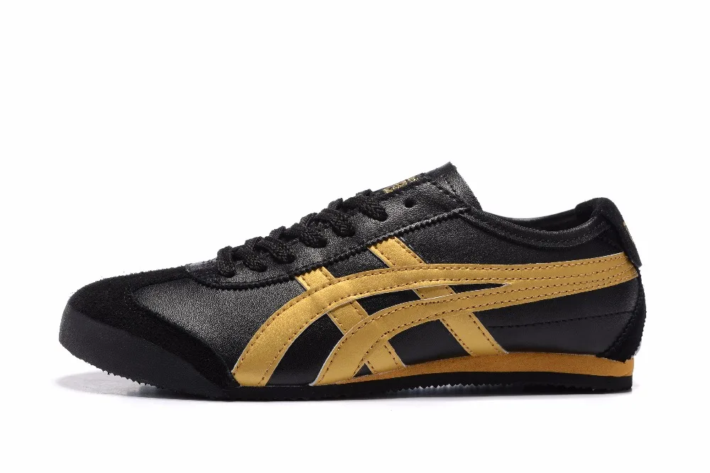 black and gold onitsuka tigers