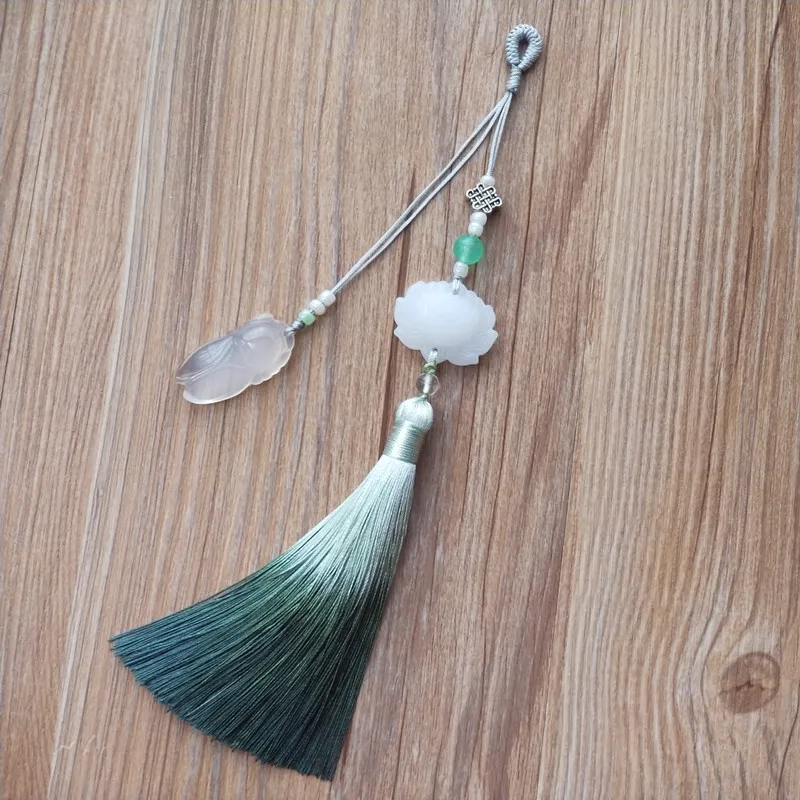 

Natural brooch tassel grain cotton and linen robe deserve to act the role of traditional Chinese pressure inner accessories