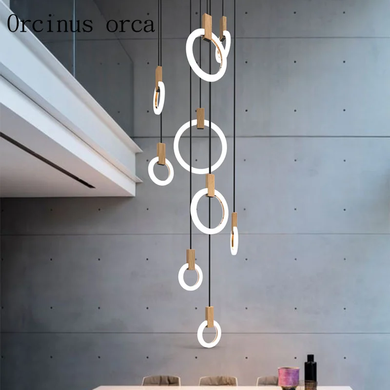 

Nordic post-modern simple glass chandelier living room restaurant double staircase industrial wind creative art chandelier.