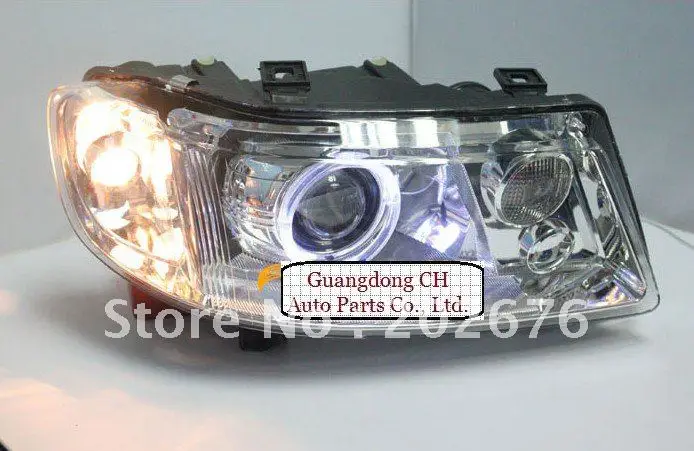 

FREE SHIPPING, ORIGINAL JETTA HEADLIGHT CONVERSION ASSEMBLY WITH BI-XENON PROJECTOR