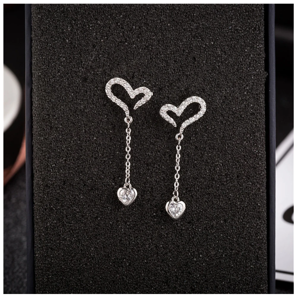 

New simple style hollow heart-shaped earring female micro-embedded zirconia earrings s925 sterling silver pin ear studs
