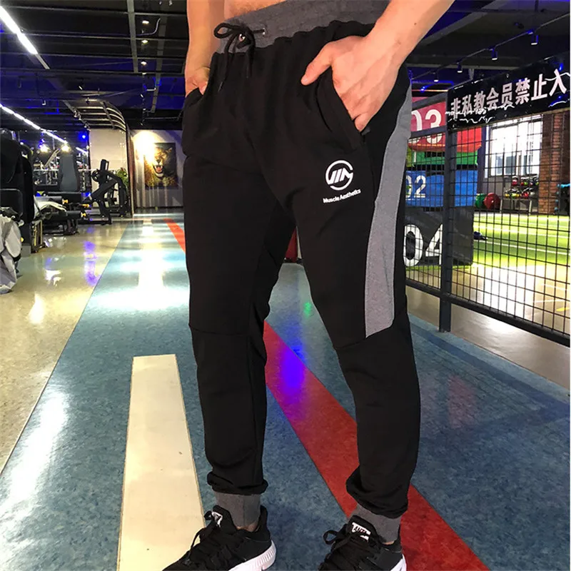 2019 Fashion Mens Pants New Solid Color Casual Soft Elastic Cotton Skinny Sweatpants Bodybuilding Pencil Trousers Gyms Clothing