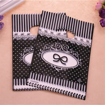 

2016 Hot Sale New Design Wholesale 100pcs/lot 15*20cm Birthday Gift Packaging Bags With Bow-knot Plastic Gift Packaging Bags