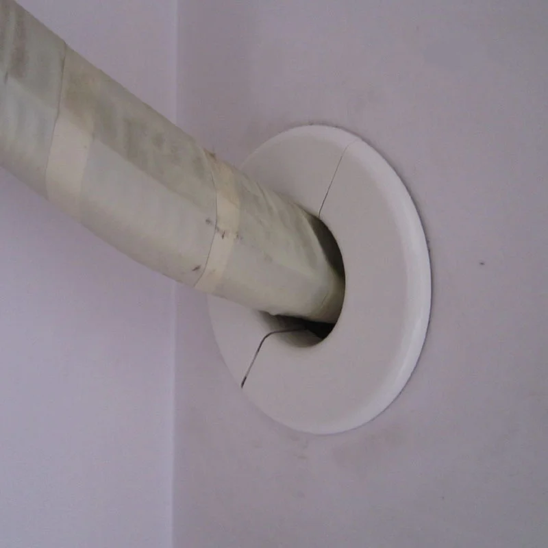 Металлическая проходка для круглых труб. Заделка отверстий в потолке. Кольцо на трубу кондиционера. Обвод трубы под натяжной потолок. Как закрыть отверстие в трубе.