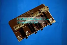 free shipping new wilkinson 4 strings electric bass guitar bridge in gold L18-1