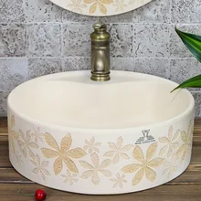Luxurious Mediterranean carve patterns or designs on woodwork stage basin. The sink