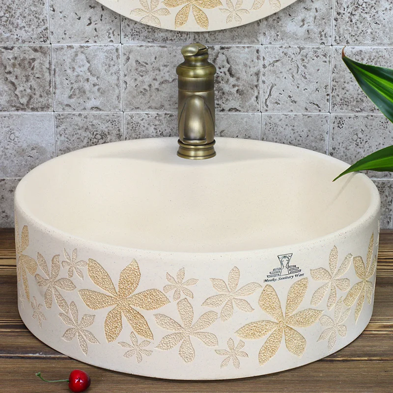 

Luxurious Mediterranean carve patterns or designs on woodwork stage basin. The sink