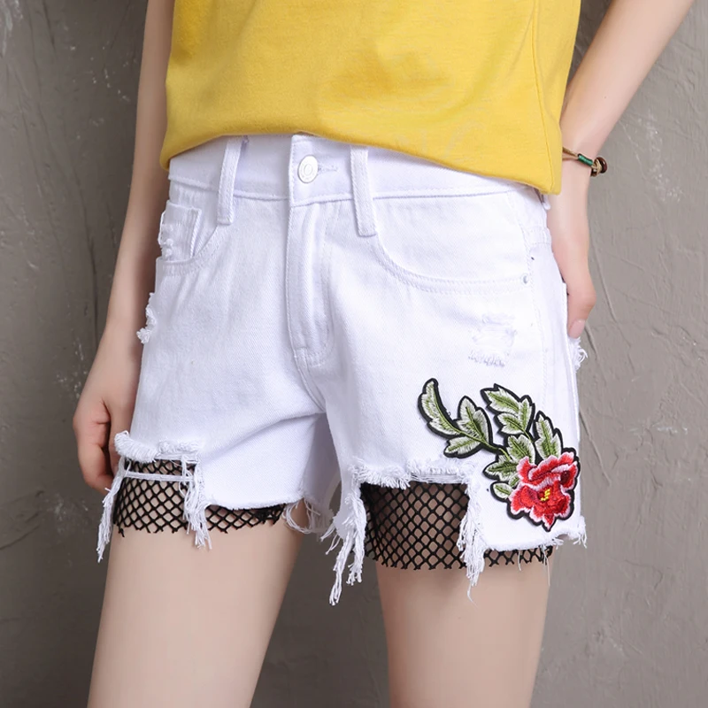 

2017, the new fashion slim slim, net buttocks, embroidery, broken holes, washed two-color, no Cowboy SHORTS, mail