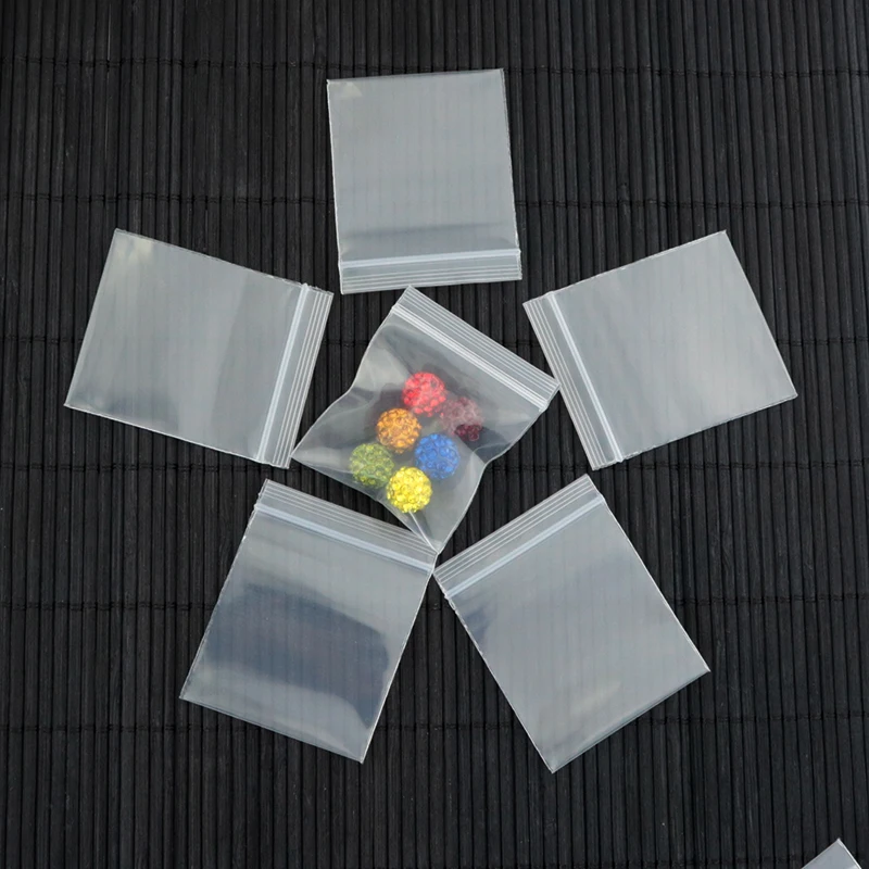 

100Pcs/Lot Small 2.7cm*3.5cm Clear Zip Lock Resealable Ziplock Grip Seal Plastic Retail Package Bag Zipper Packing Pack Pouch